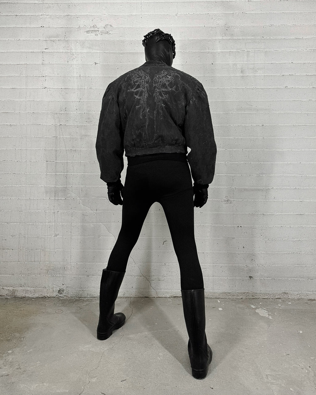 LATEX COATED BOMBER WITH RELIEF