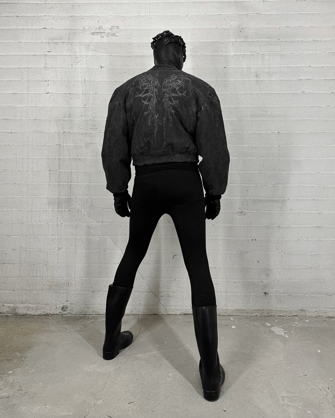 LATEX COATED BOMBER WITH RELIEF